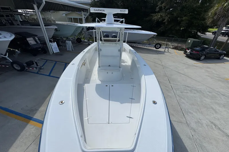 Slide: The Image of 2007 Venture 34 Open boat with Garmin radar, docked in a marina. - 22