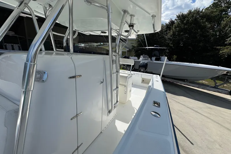 Slide: The Image of 2007 Venture 34 Open boat with sleek white deck and stainless steel fittings. - 24