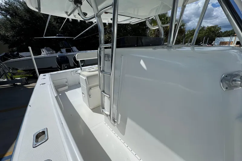 Slide: The Image of 2007 Venture 34 Open boat interior with seating and console, showcasing sleek design. - 25