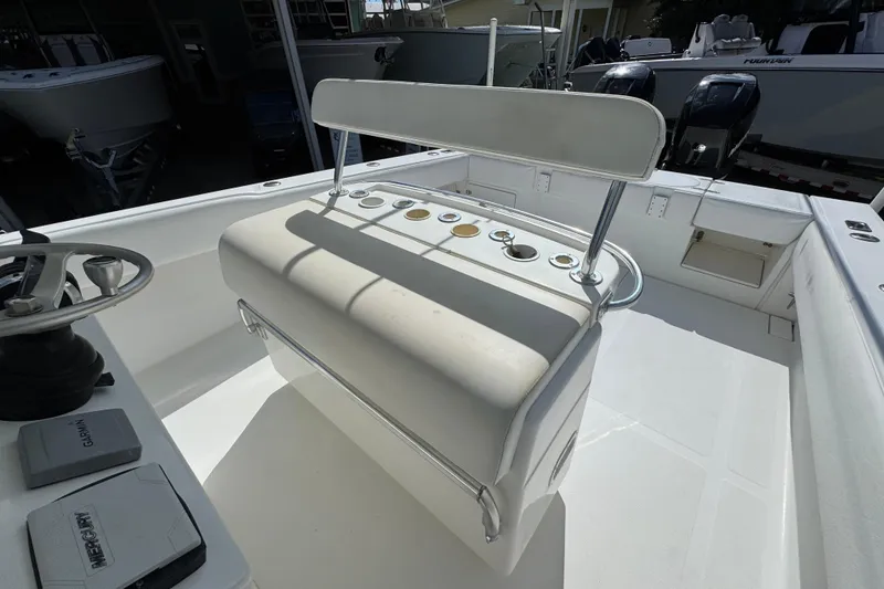 Slide: The Image of 2007 Venture 34 Open boat interior with steering console and seating area. - 27