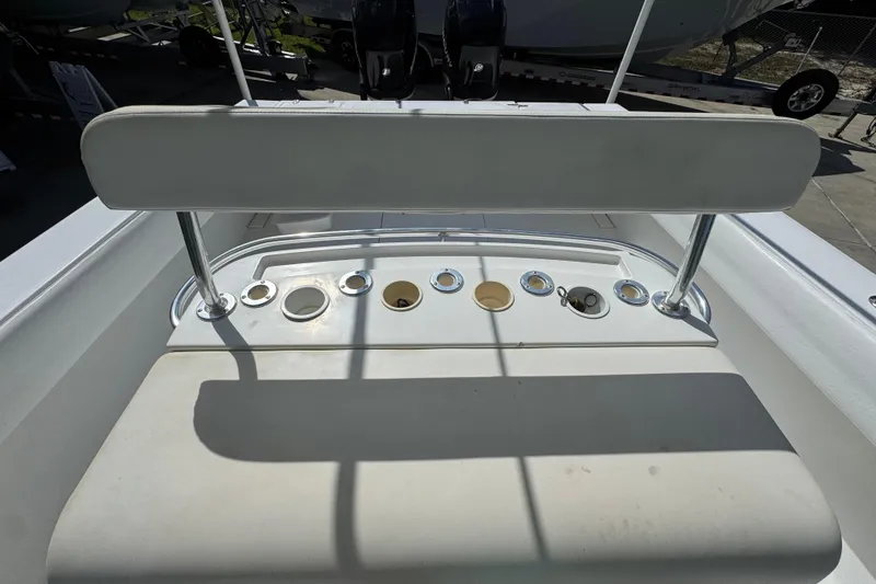 Slide: The Image of 2007 Venture 34 Open boat interior with rod holders and seating. - 28