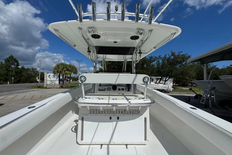 Slide: The Image of 2007 Venture 34 Open boat, center console view, clear sky, outdoor setting. - 35