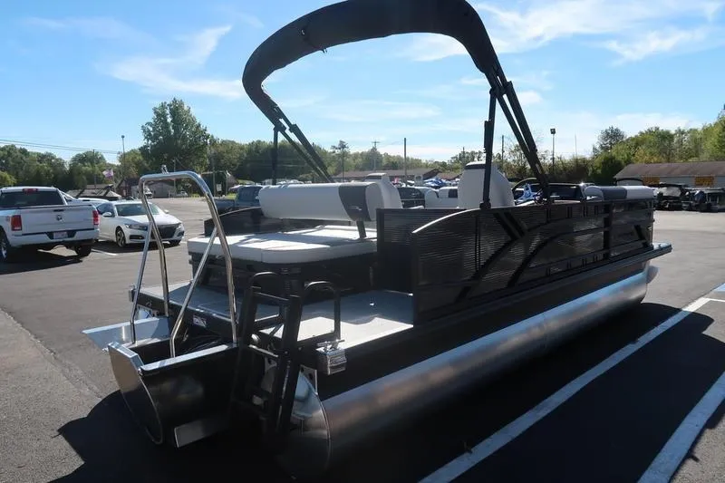 Slide: The Image of Storage compartment of 2026 Bennington S Swingback 22 SSB boat, featuring wiring and battery setup. - 13