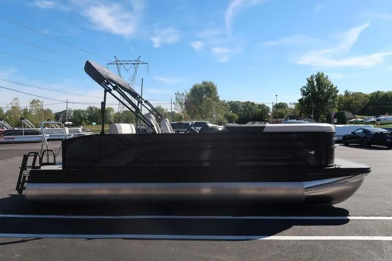 Slide: The Image of 2026 Bennington S Swingback 22 SSB pontoon boat interior with gray seating and table. - 3