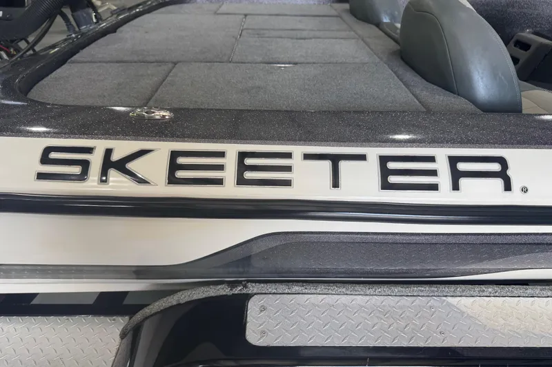 Slide: The Image of 2011 Skeeter ZX225 boat with sleek design and comfortable seating. - 3