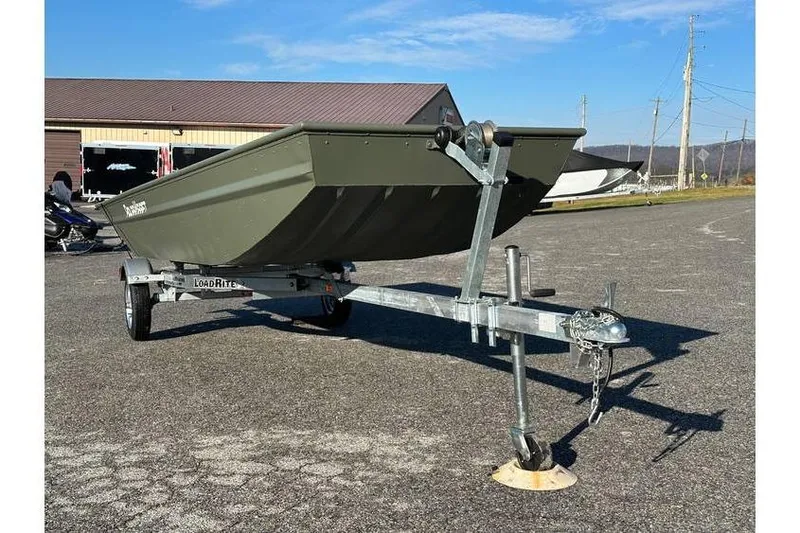 Slide: The Image of 2024 Polar Kraft 1648 Jon Boat with trailer, parked outdoors on asphalt. - 3