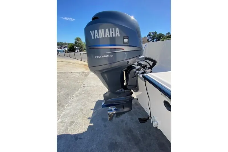 Slide: The Image of Yamaha four-stroke outboard motor on 2004 Sea Hunt Triton 220 boat. - 5
