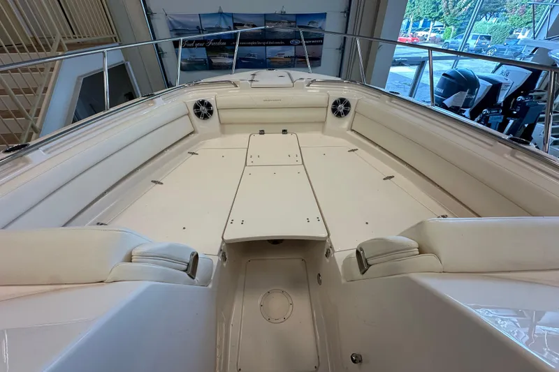 Slide: The Image of 2019 Grady-White Freedom 325 boat interior with spacious seating and sleek design. - 13