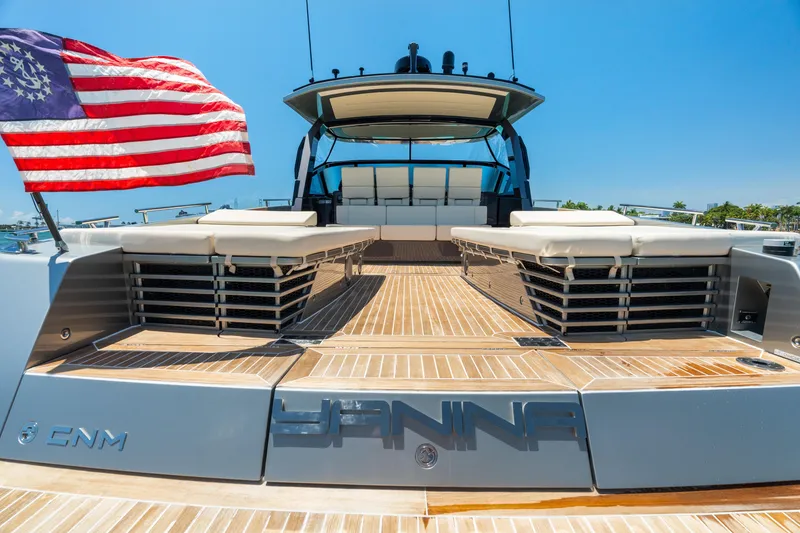 Slide: The Image of Luxury CNM Continental 54T yacht deck with American flag, 2019 model. - 14