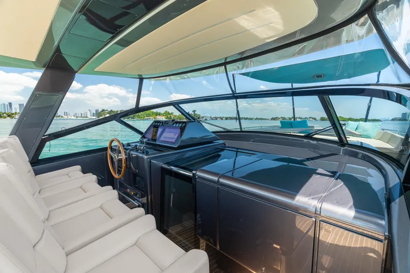 Slide: The Image of Luxurious 2019 CNM Continental 54T yacht interior with modern dashboard and panoramic views. - 15
