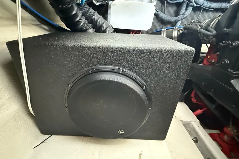 Slide: The Image of Subwoofer installed in 2011 Rinker 276 Captiva boat engine compartment. - 34