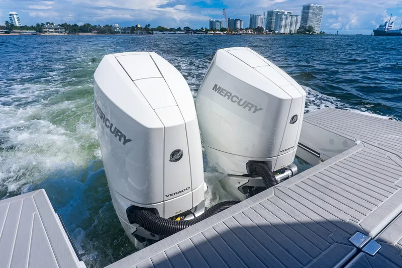 Slide: The Image of 2024 Cruisers Yachts 34 GLS OB with dual Mercury outboard engines on water. - 17