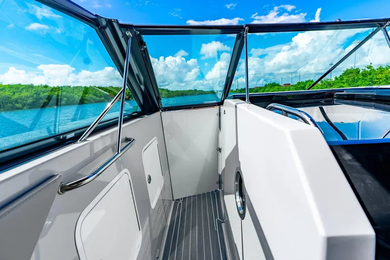 Slide: The Image of 2024 Cruisers Yachts 34 GLS OB interior with scenic water view. - 37