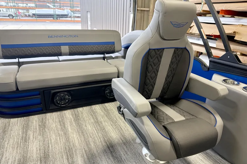Slide: The Image of 2026 Bennington 24 MSB boat interior with luxurious seating and modern design. - 5