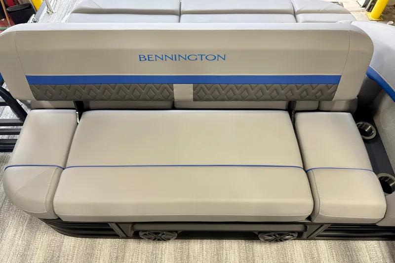 Slide: The Image of 2026 Bennington 24 MSB boat seat with gray upholstery and blue accents. - 9