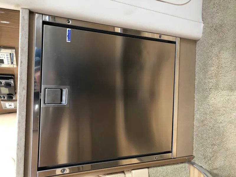 Slide: The Image of Stainless steel refrigerator in 2013 Formula 350 Sun Sport boat interior. - 14