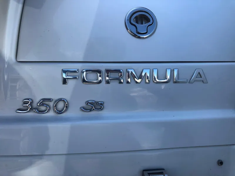 Slide: The Image of 2013 Formula 350 Sun Sport boat emblem with chrome lettering. - 38