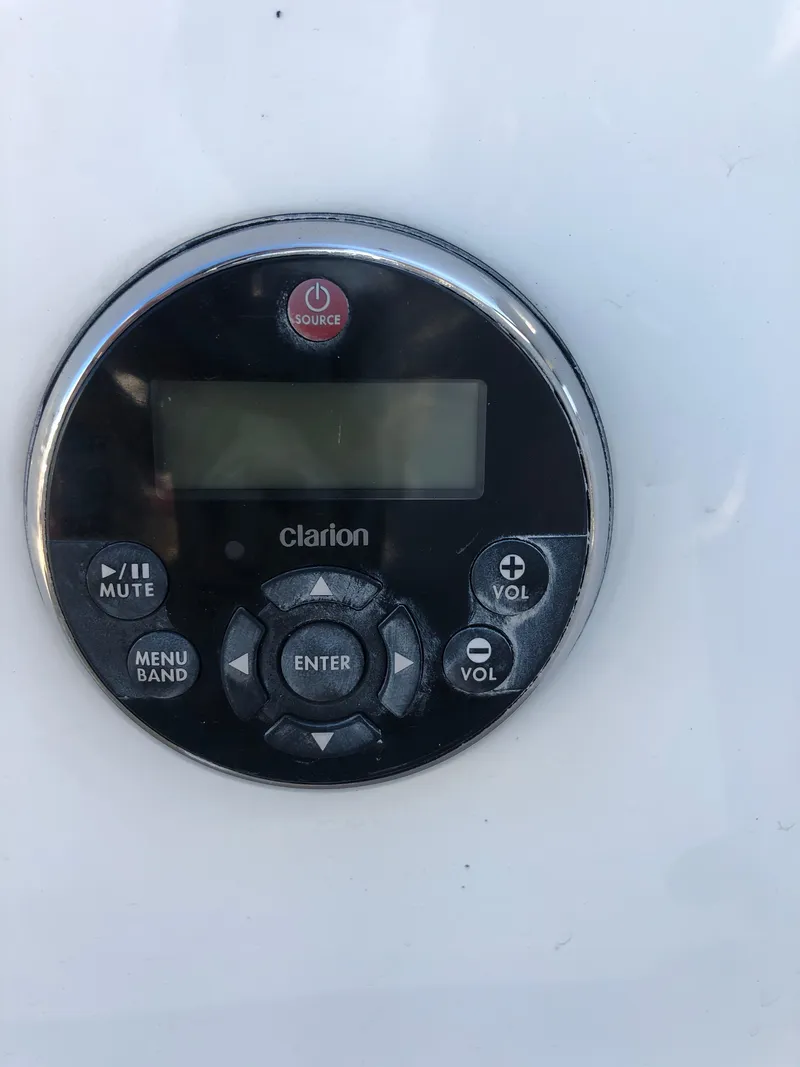 Slide: The Image of Clarion audio control panel on 2013 Formula 350 Sun Sport boat. - 43