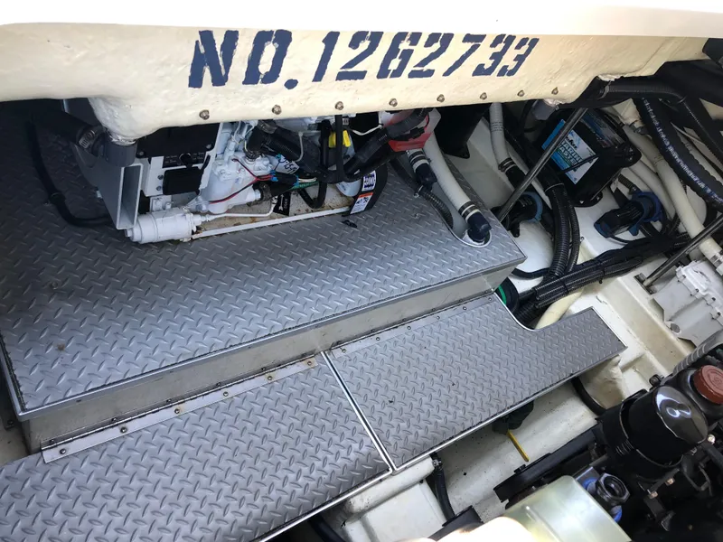 Slide: The Image of Engine compartment of a 2013 Formula 350 Sun Sport boat with visible serial number. - 44