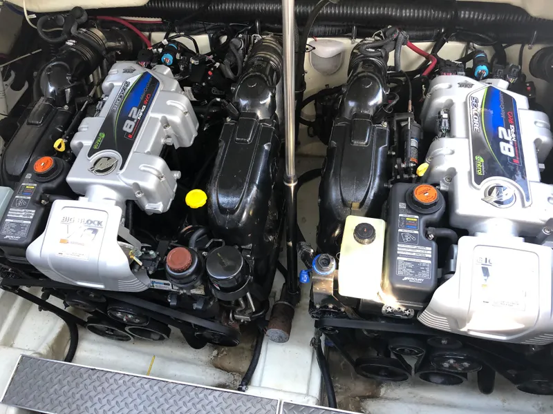 Slide: The Image of Twin engines of a 2013 Formula 350 Sun Sport boat, showcasing powerful 8.2-liter motors. - 46
