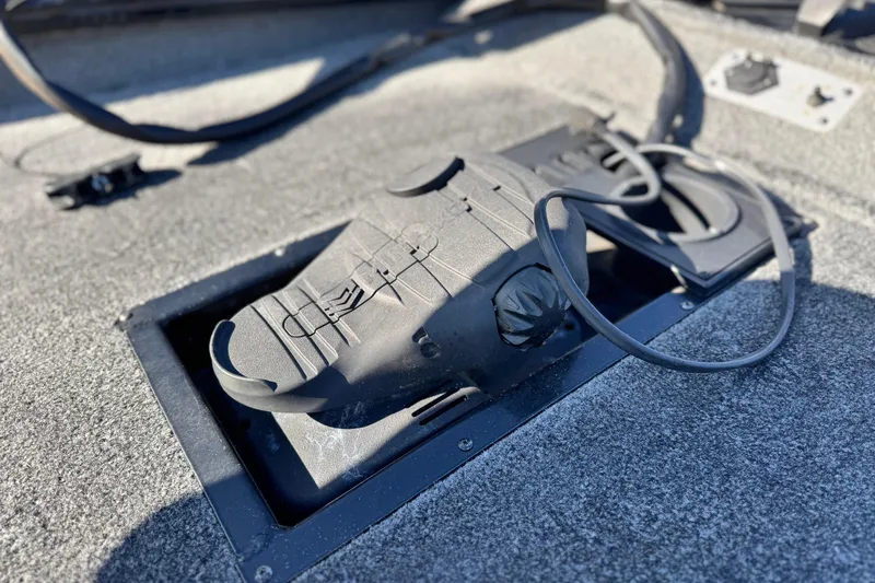 Slide: The Image of 2019 Tracker Pro Team 175 boat pedal control on deck. - 10