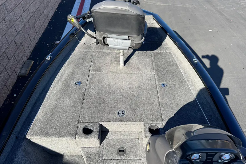 Slide: The Image of 2019 Tracker Pro Team 175 boat deck with seating and control panel. - 11