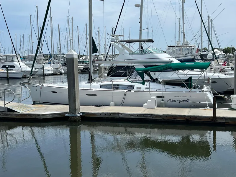 The Image of 2007 Beneteau Oceanis 46 sailboat docked in a marina. - 0