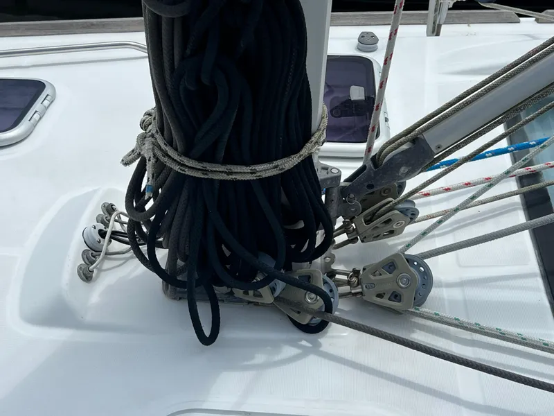 Slide: The Image of Beneteau Oceanis 46 sailboat rigging and ropes, 2007 model, on deck view. - 20