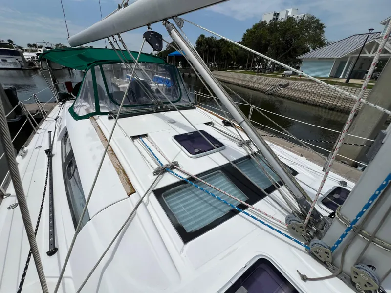 Slide: The Image of 2007 Beneteau Oceanis 46 sailboat docked, featuring deck and rigging details. - 25