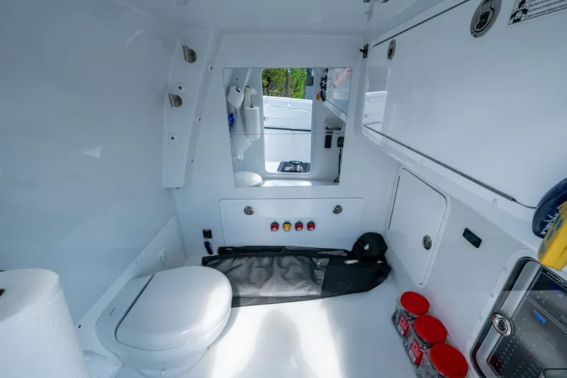 Slide: The Image of Interior of 2025 Invincible 33 Catamaran featuring modern amenities and sleek design. - 4