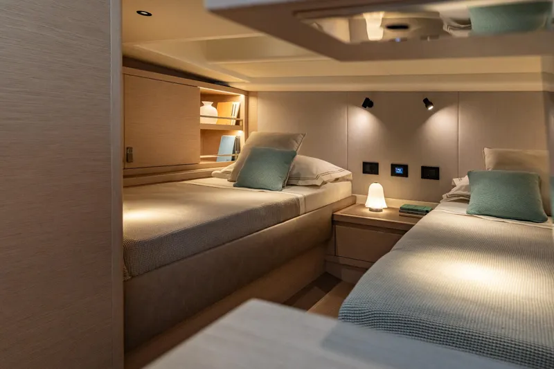 Slide: The Image of 2026 Pardo Yachts P43R cruising on open water, aerial view. - 18