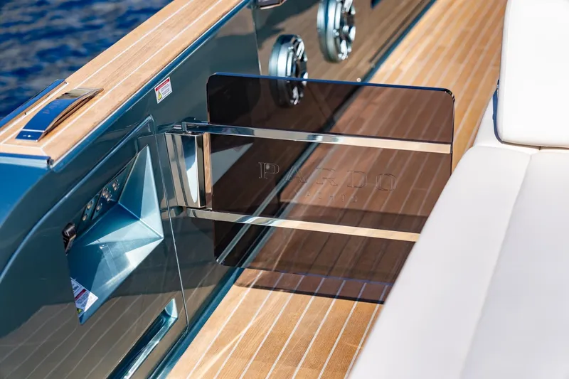 Slide: The Image of 2026 Pardo Yachts P43R cruising on open water under a cloudy sky. - 22