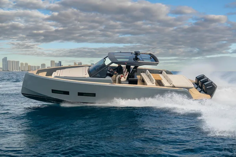 Slide: The Image of 2026 Pardo Yachts P43R cruising on open water under a partly cloudy sky. - 33