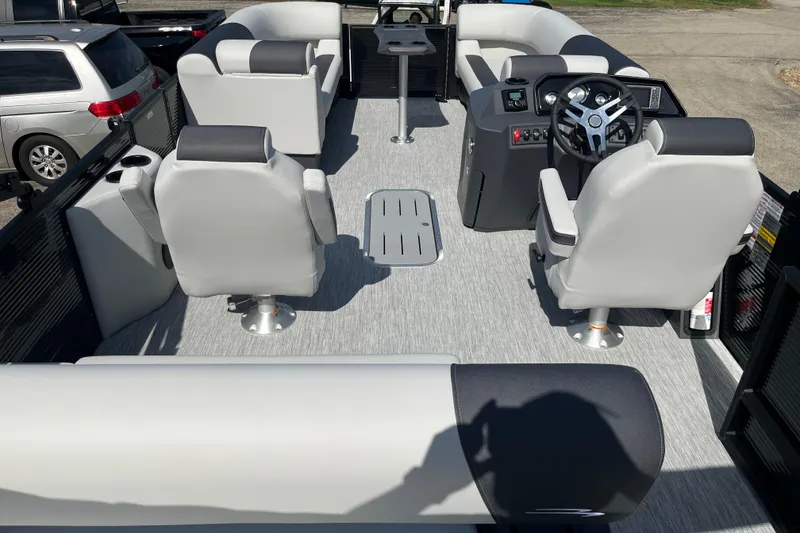 Slide: The Image of 2026 Bennington S Line boat interior with modern seating and steering console. - 17