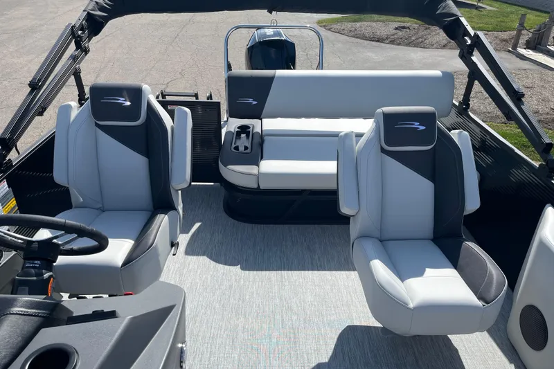 Slide: The Image of 2026 Bennington S Line boat interior with modern seating and steering wheel. - 5