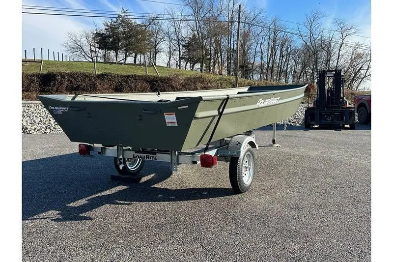 Slide: The Image of 2024 Polar Kraft 1448 Jon Boat with trailer, parked outdoors on a sunny day. - 5