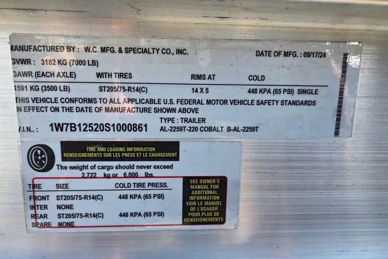 Slide: The Image of Label on 1996 Cobalt 220 trailer showing tire and loading information. - 45