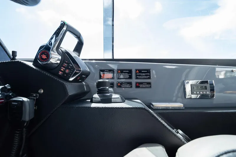 Slide: The Image of Control panel of a 2025 Hanover 387 boat, featuring modern navigation and control systems. - 26