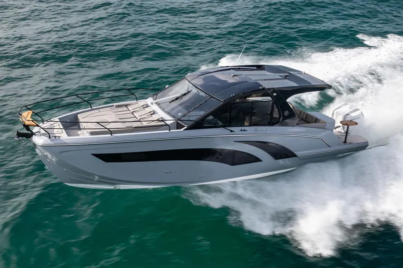 Slide: The Image of 2025 Hanover 387 yacht cruising swiftly on open water. - 8