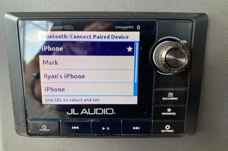 Slide: The Image of JL Audio Bluetooth device selection screen in a 2018 Manitou 25 X-Plode SRW SHP. - 25