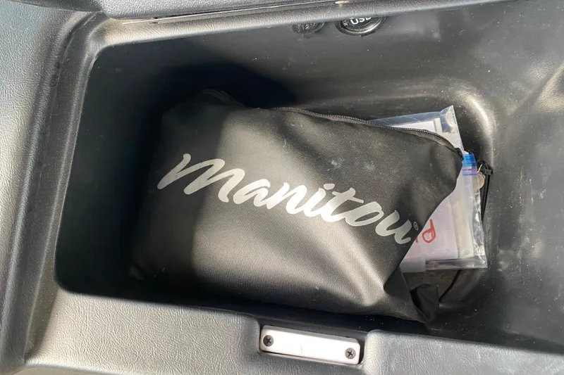 Slide: The Image of Black Manitou bag inside a compartment, 2018 Manitou 25 X-Plode SRW SHP. - 28