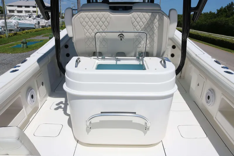 Slide: The Image of 2026 World Cat 295 CC boat interior with seating and storage features. - 13