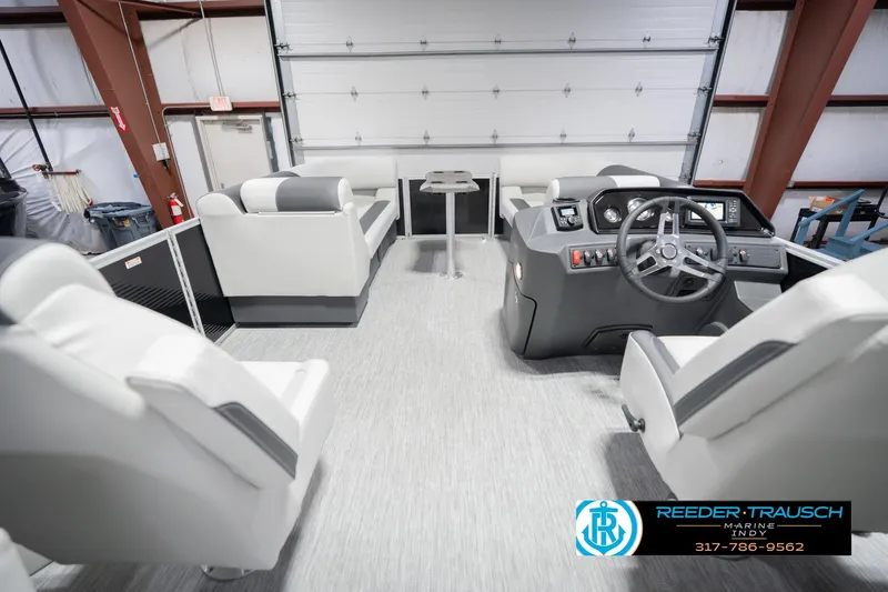 Slide: The Image of Interior of 2026 Bennington 22 SSR pontoon boat with modern seating and helm. - 20