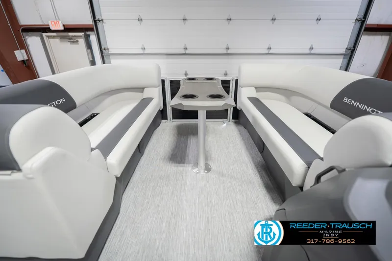 Slide: The Image of Interior of 2026 Bennington 22 SSR pontoon boat with seating and table. - 21