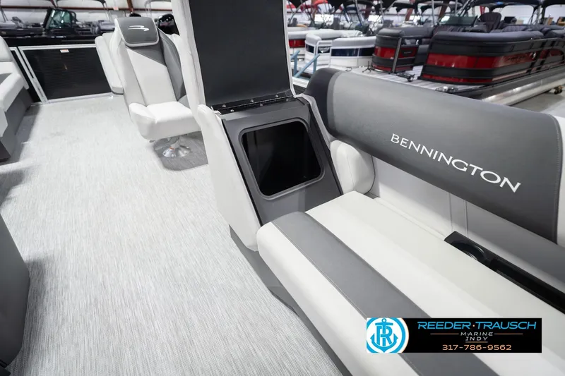 Slide: The Image of 2026 Bennington 22 SSR pontoon boat interior with seating and storage compartment. - 25
