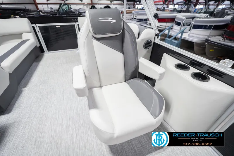 Slide: The Image of 2026 Bennington 22 SSR boat interior with plush seating and cup holders. - 27