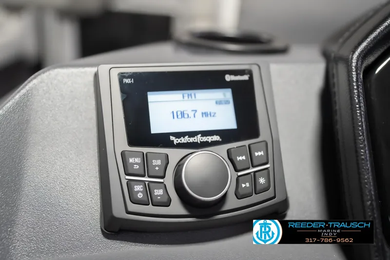 Slide: The Image of 2026 Bennington 22 SSR boat stereo system with Rockford Fosgate display showing FM 106.7 MHz. - 35