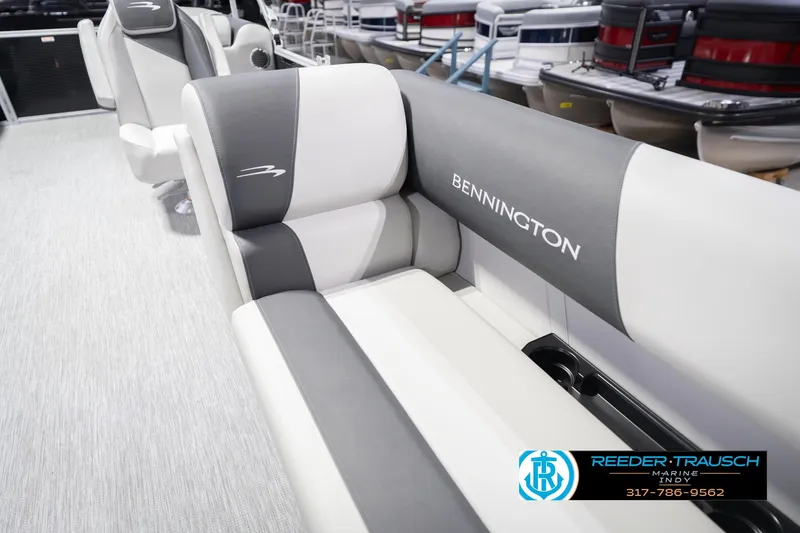 Slide: The Image of 2026 Bennington 22 SSR boat interior with gray and white seating. - 44