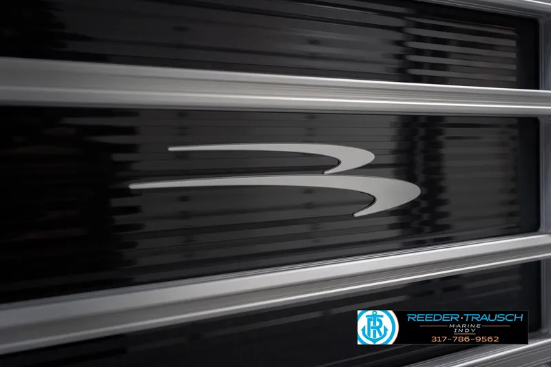 Slide: The Image of 2026 Bennington 22 SSR logo on sleek black and silver boat panel. - 48