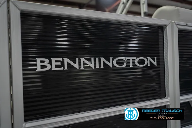 Slide: The Image of 2026 Bennington 22 SSR boat panel with logo, displayed at Reeder-Trausch Marine. - 51